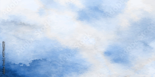Bright white fluffy clouds float across a clear blue sky background on a sunny summer day creating a beautiful nature atmosphere and freedom in the light airy cloudscape