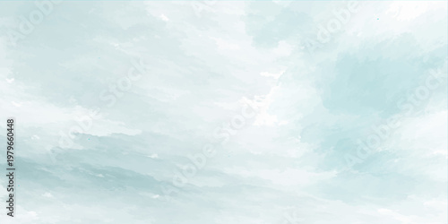 Fluffy white cirrus clouds drift across a bright summer cloudscape in a beautiful clear blue sky background representing the high atmosphere and light of a peaceful day in nature