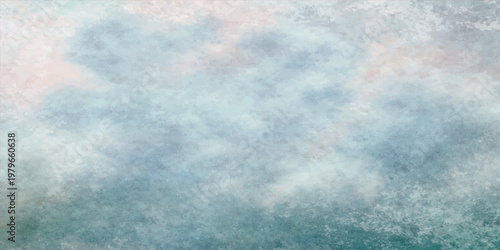 A clear blue sky background features white clouds and bright summer sun light across a beautiful abstract nature cloudscape atmosphere