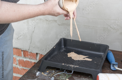 Wallpaper Mural Hands pour paint onto a tray Torontodigital.ca