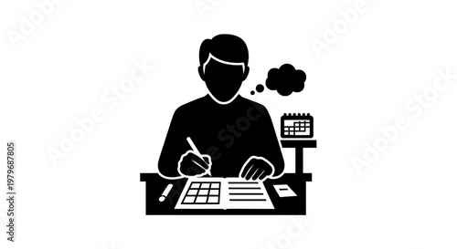 Man sitting at desk with paperwork.