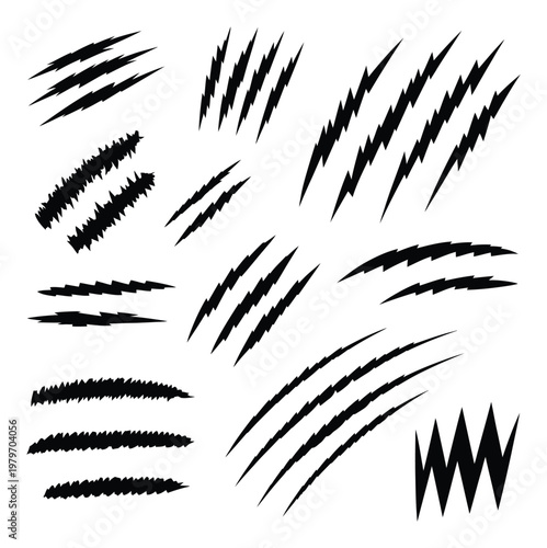 Collection of Black Claw Marks and Jagged Lines on White Background