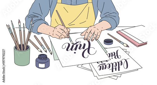 Person creating calligraphy art with brushes.