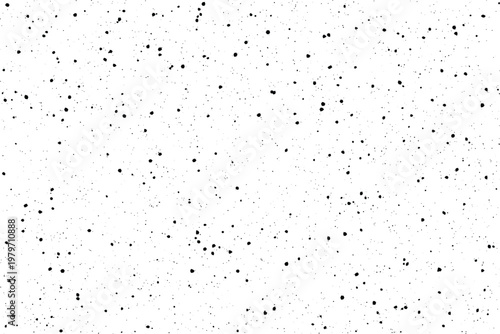 A pattern of small dark ink spots spread unevenly across a brilliant white canvas creating a distressed effect