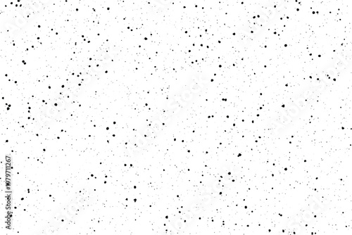 A scattered arrangement of small dark blemishes provides a worn and imperfect appearance on white