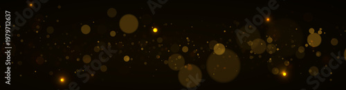 Photos Golden dust glows with bright luminous particles