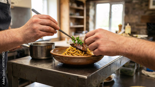 Chef Plating Linguine With Chicken Liver And Herbs At Remote Mountain Inn, Hands Only, Warm Ceramic Bowl, Stainless Pass, Documentary Culinary Scene, Fine Dining Prep