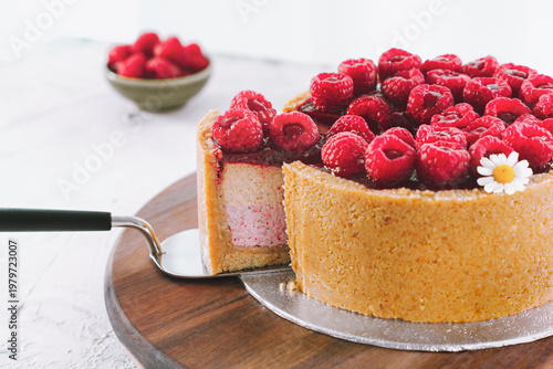 Raspberry Cake Slice Served With Fresh Berries