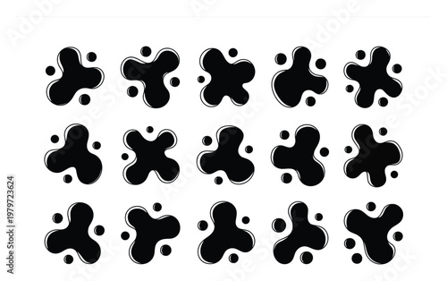 Collection of black ink blots with small dots on a white background