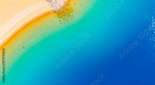 Aerial Top View of a Pristine Tropical Beach with Crystal Clear Turquoise Water and White Sand