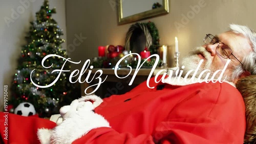 Animation of feliz navidad text over santa claus sleeping at christmas