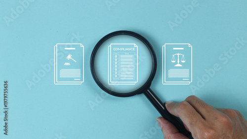Fotografie ompliance and certification concept showing a hand with a magnifying glass inspe