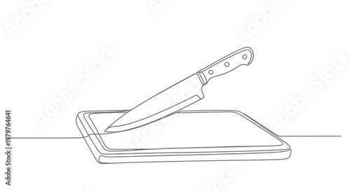 Knife on a cutting board surface.