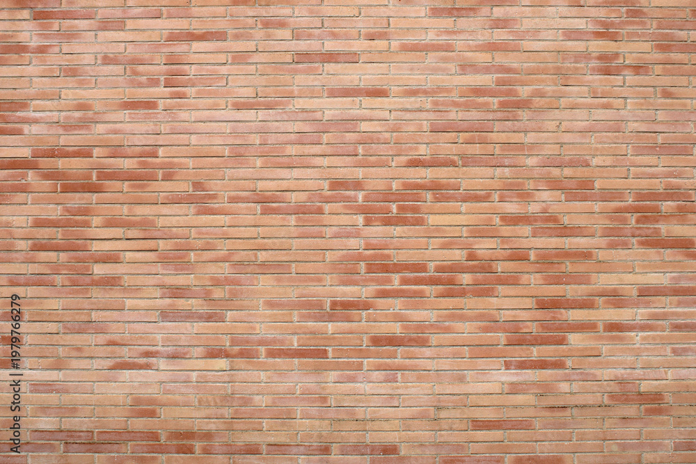 Fototapeta premium Mur de briques de couleur rouge, rose, orange