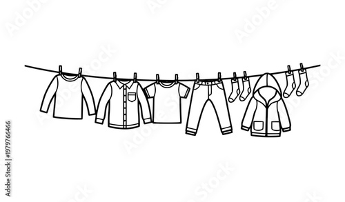 Minimal black and white boys clothes on clothesline vector illustration kids laundry fashion concept