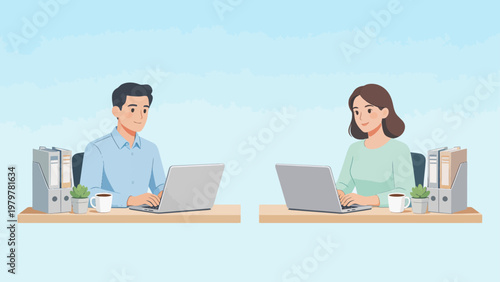 Two people working on laptops at desks