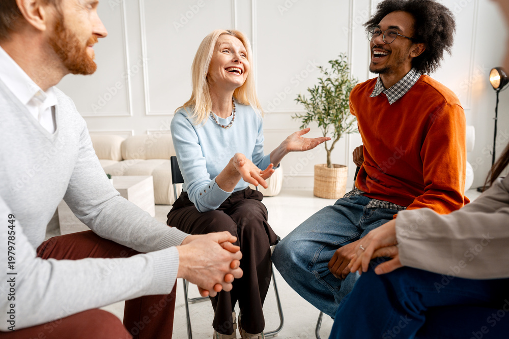 Fototapeta premium Diverse people participating in laughing group therapy session