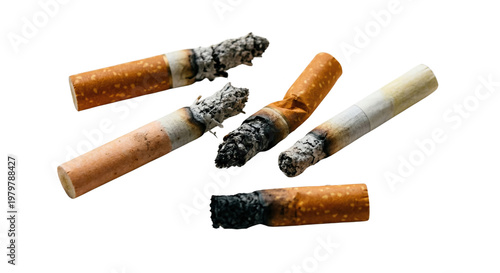 Scattered extinguished cigarette butts on dark background