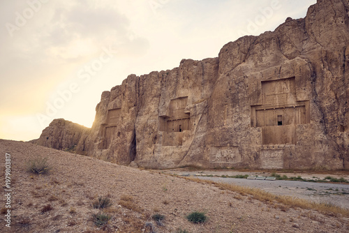 Ancient tomb carved in rock in Naqsh-e Rostam near Persepolis, Iran