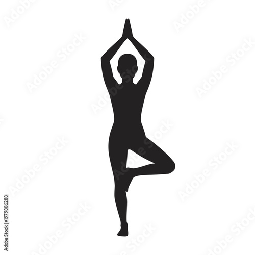 Silhouette of a woman doing a yoga tree pose