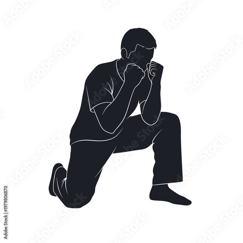 Silhouette of a man in boxing stance, kneeling on one knee, preparing to fight or train