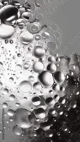Abstract Macro Bubbles and Droplets Flowing, Liquid Surface Texture, Close-up View