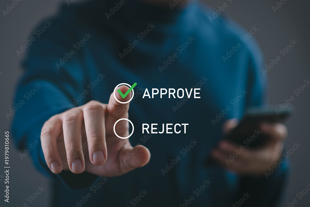 Obraz premium Business approval decision concept with hand selecting approve option on digital interface. Workflow authorization, online confirmation, compliance review, and management decision process.