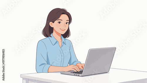 Woman working on laptop at desk