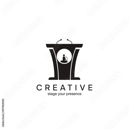 Black podium with microphone and creative logo.