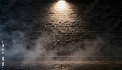 Dark brick wall illuminated by a single spotlight with wisps of smoke rising from the ground