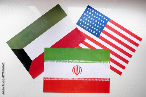 USA, Iran, Kuwait flags on white background. Mockup. Geopolitical Conflict and Diplomacy Concept