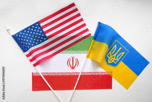 USA, Ukraine, Iran flags on white background. Mockup. Geopolitical Conflict and Diplomacy Concept
