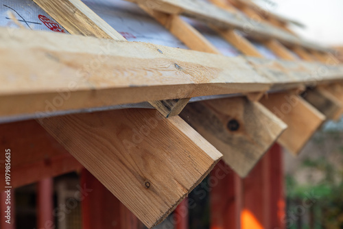 Bilde på lerret lose-up of a wooden roof frame during construction