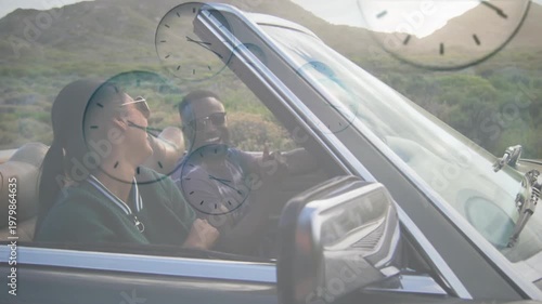 Vertical video: Open-top drive starting, clocks drifting as driver steering and passenger cheering