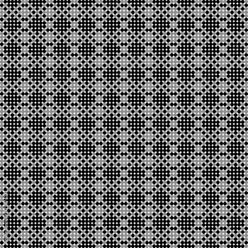 A seamless abstract geometric background featuring a repeating halftone pattern of black and grey circles on a white backdrop.