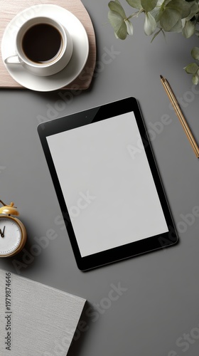 Minimalist Workspace with Coffee, Tablet, and Writing Materials