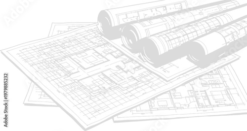 Architectural blueprints and rolled construction plans on a table indoors