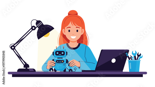 Happy girl sitting at her desk and building a robot with a laptop and tools under a desk lamp for school project.