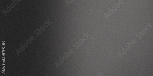 Dark grey metallic texture with a grainy surface and smooth light reflections for a modern look.
