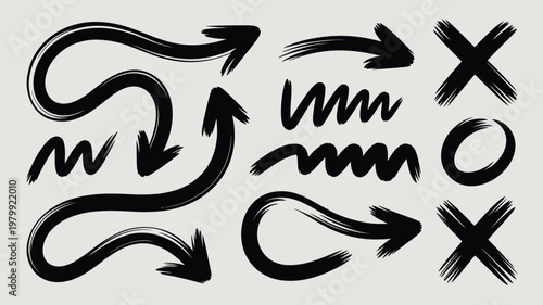 A collection of abstract black brushstroke arrows and directional elements