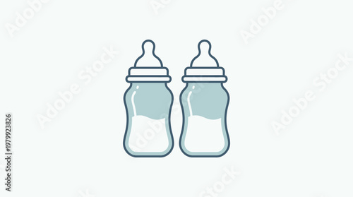 Two Baby Bottles Filled With Milk