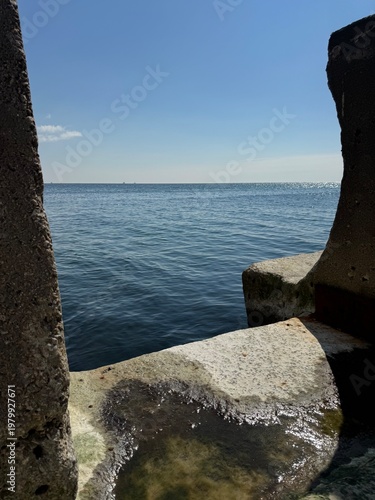 Under the pier by the sea