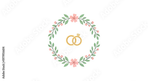 Golden wedding rings with floral wreath.