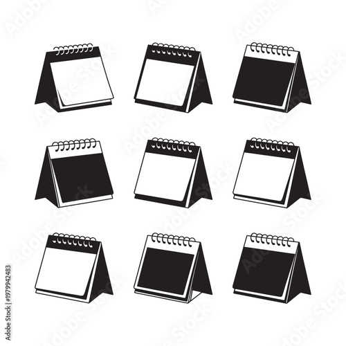 Collection of black and white desk calendars arranged in a grid pattern