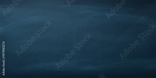 A dark grunge blue blackboard surface featuring a blank vintage texture and rough dirty design, perfect as a backdrop or wallpaper with a faint smoke pattern on the old wall material