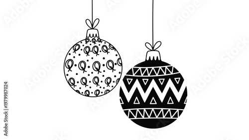Pair of hanging Christmas baubles featuring intricate black and white patterns like circles and geometric zigzags on a plain white background.