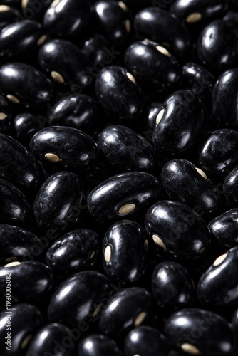 Black Beans: A close-up, high-angle shot captures a rich display of black beans, each smooth and shiny, ready to be incorporated into culinary creations.