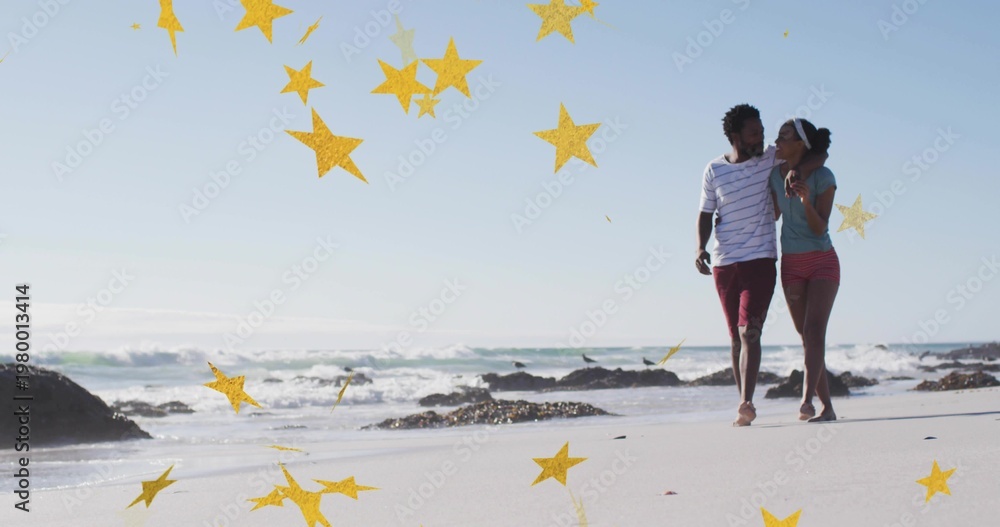 Naklejka premium Strolling couple wearing striped shirt, teal top on wet sand near waves, golden stars, copy space