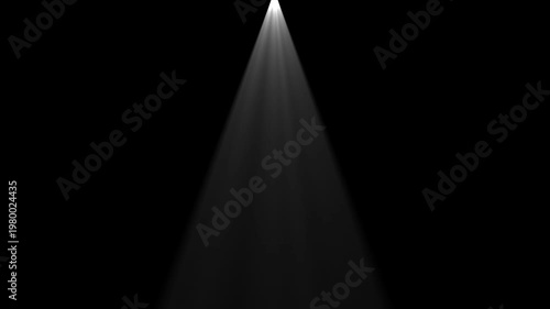 Dramatic white spotlight beam on black background, cinematic stage lighting effect for overlay and motion