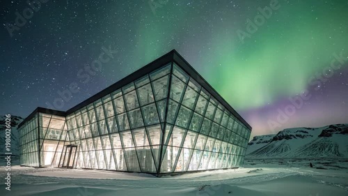 Modern Glass Building Under Northern Lights